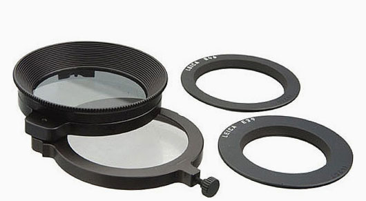 Leica Universal Top (Linear) Polarizer Glass Filter. This one is made so you can swing up the filter to see through a traditional viewfinder how the effect till be. You will need the 49mm adapter as well.
