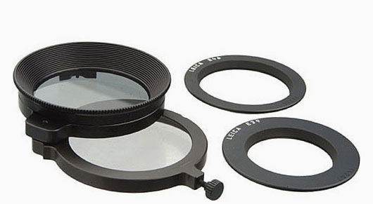 Leica Universal Top (Linear) Polarizer Glass Filter. This one is made so you can swing up the filter to see through a traditional viewfinder how the effect till be. You will need the 49mm adapter as well.