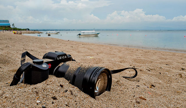 I've been at it before. When in Bali with my Leica SL, I decided to test the weather sealing of the Leica SL and the lenses. I wouldn't do this with a Leica M lens, but the Leica SL lenses are perfectly sealed for rain and sand.  