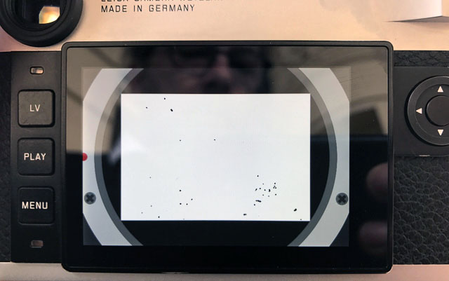 This is how the preview screen on the back of the Leica M10 looks when you press "sensor cleaning" in the menu. Unlike what you might expect, the camera doesn't clean the sensor. It simply scans the sensor for dirt and show a prview of what's in store. It might look impressive, but this is nothing. If you use your lenses wide open as I do, you will seldom see the spots on the sensor. If you stop down to f/4.0 or f/11, that's when your pictures start looking like this preview.  