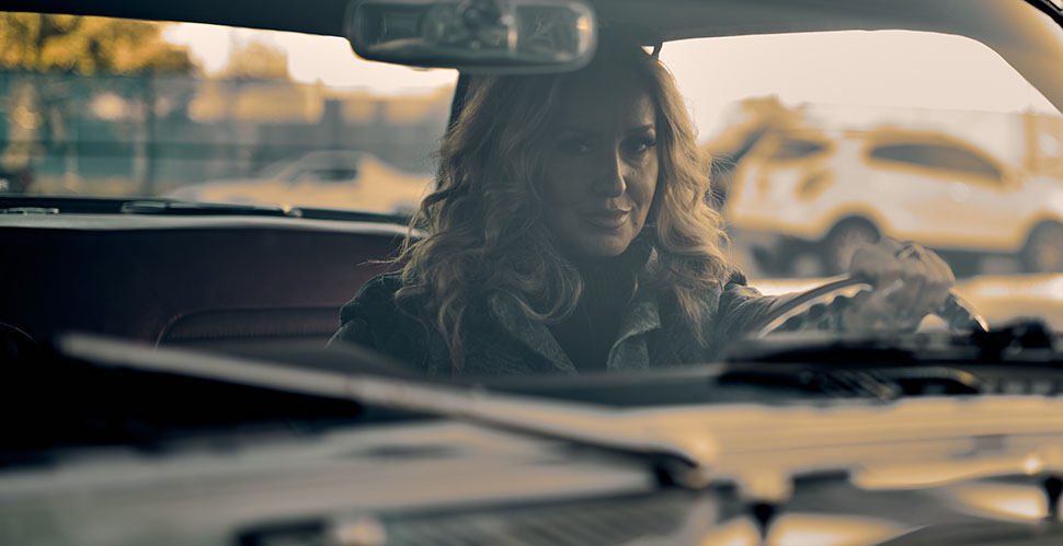 Layla behind the wheel of a 1966 Ford Mustang. Leica M11 with Leica 50mm APO-Summicron-M ASPH f/2.0. © Thorsten Overgaard.