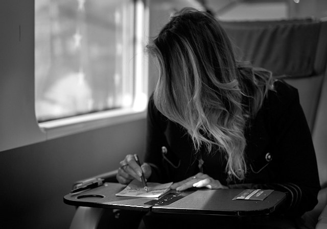 Layla making art en route to Milano from Paris. Leica M11 with Leica 50mm APO-Summicron-M ASPH f/2.0 LHSA. © Thorsten Overgaard. 