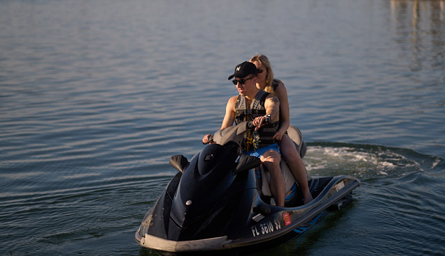 Caroline and Nathan on Jetski early Saturday morning, celebrating Caroline's 27th birthday. Leica M11 with Leica 90mm APO-Summicron-M ASPH f/2.0. © Thorsten Overgaard. 