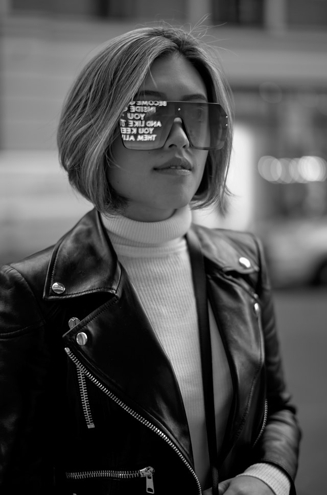 Anya looking at neon art in London. Leica M10-P with Leica 50mm Summilux-M ASPH f/1.4 BC. © Thorsten Overgaard.