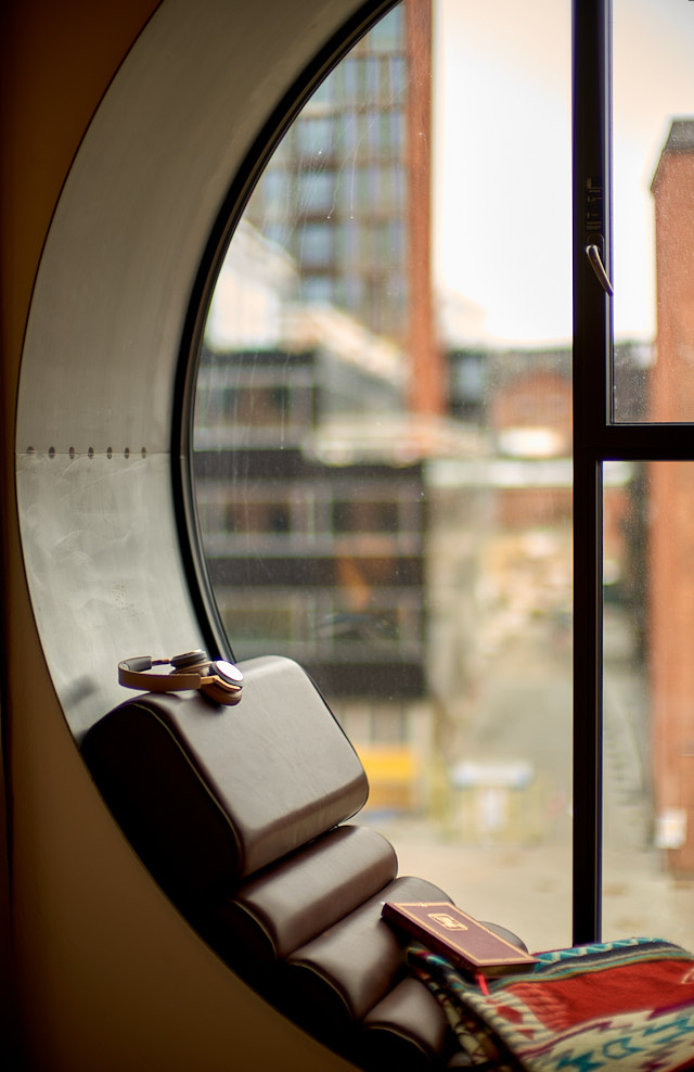 The old Carlsberg beer factory has been transformed to a trendy hotel. Here with a big round window with a view in the old Carlsberg factory in Copenhagen. © Thorsten Overgaard.