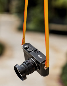 "Yosemite" 
Yellow Calfskin 
Orange Edge 
Camera Strap