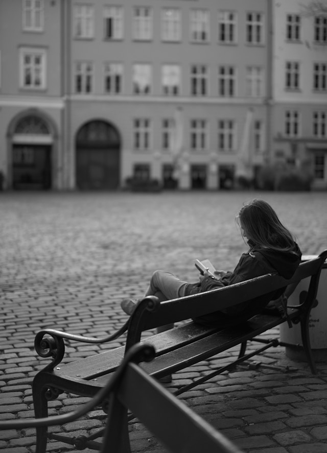 Reading at Gråbrødre Torv in Copenhagen. Leica M10-P with Leica 50mm Summilux-M ASPH f/1.4.   