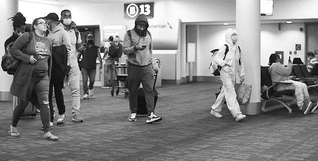 I've deliberately not taken photos of the "pandemic". But this one of a fellow passenger in full hazmat suit I had to preserve. © Thorsten Overgaard.