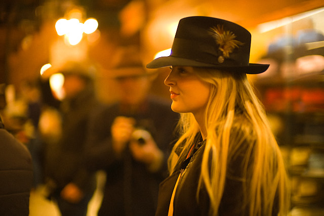 The 50mm Noctilux has an in-built magic. My daugher Caroline in the JJ Hat Store in New York. Leica M10-P with Leica 50mm Noctilux-M ASPH f/0.95. © Thorsten Overgaard.