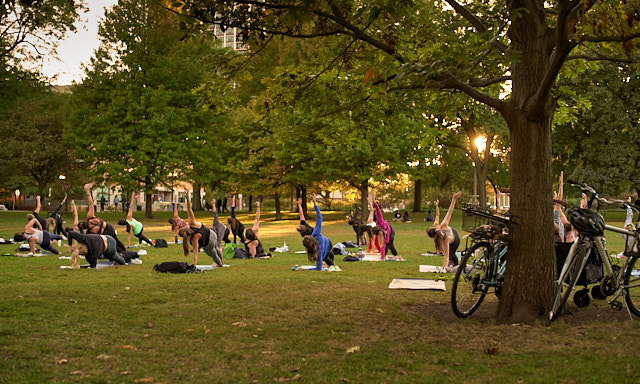 50-60 women doing yoga in the park. eica M10-P with Leica 50mm Summilux-M ASPH f/1.4. © Thorsten von Overgaard. 