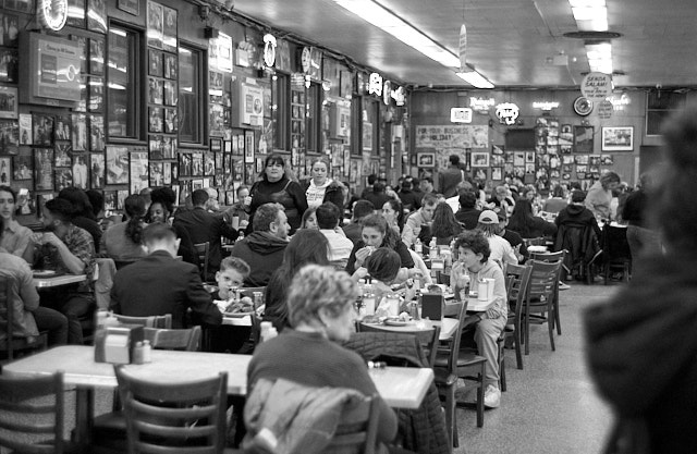 Katz's Delicatessen pretty much is full like this all day, and likely like this since they opened in 1888. I haven't tried their food. Leica M10-R with 50mm ELCAN f/2.0 by Light Lens Lab. © Thorsten Overgaard. 