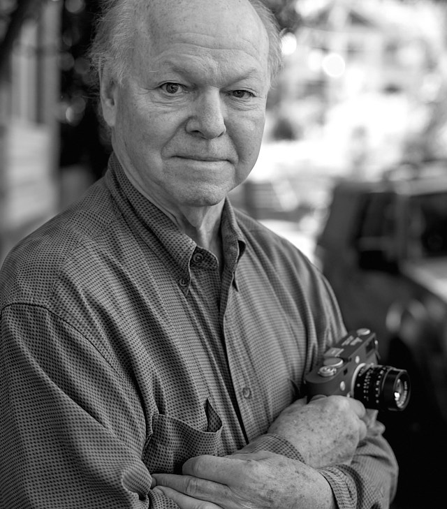 Joe C. Rude. Holidng a Leica M10-P Safari Limited Edition. Leica M10-R with Leica 50mm APO-Summicron-M ASPH f/2.0 LHSA. © Thorsten Overgaard. 
