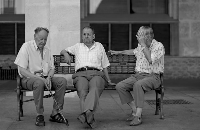 Locals engaged in a talk about what happened in life today, I guess. Leica M10-P with Leica 50mm Noctilux-M ASPH f/0.95. © Thorsten Overgaard.