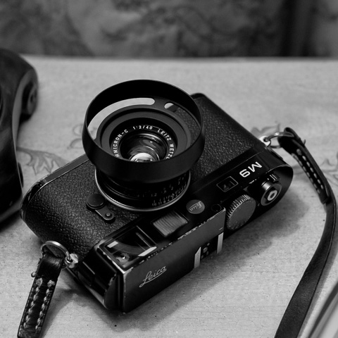 Leica 40mm Summicron-C f/2.0 with the E39 ventilated shade.