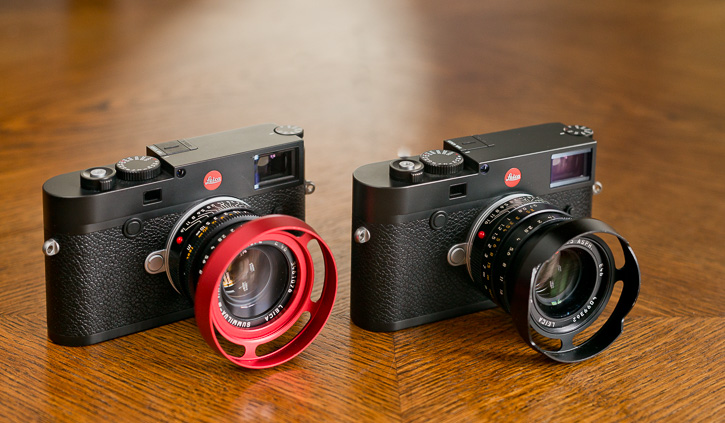E46 ventilated hood RED on the 35mm Summilux AA (left) and the 3514FLE ventilated shade on the newer 35mm Summilux f/1.4 FLE that has an outside thread for shade. 