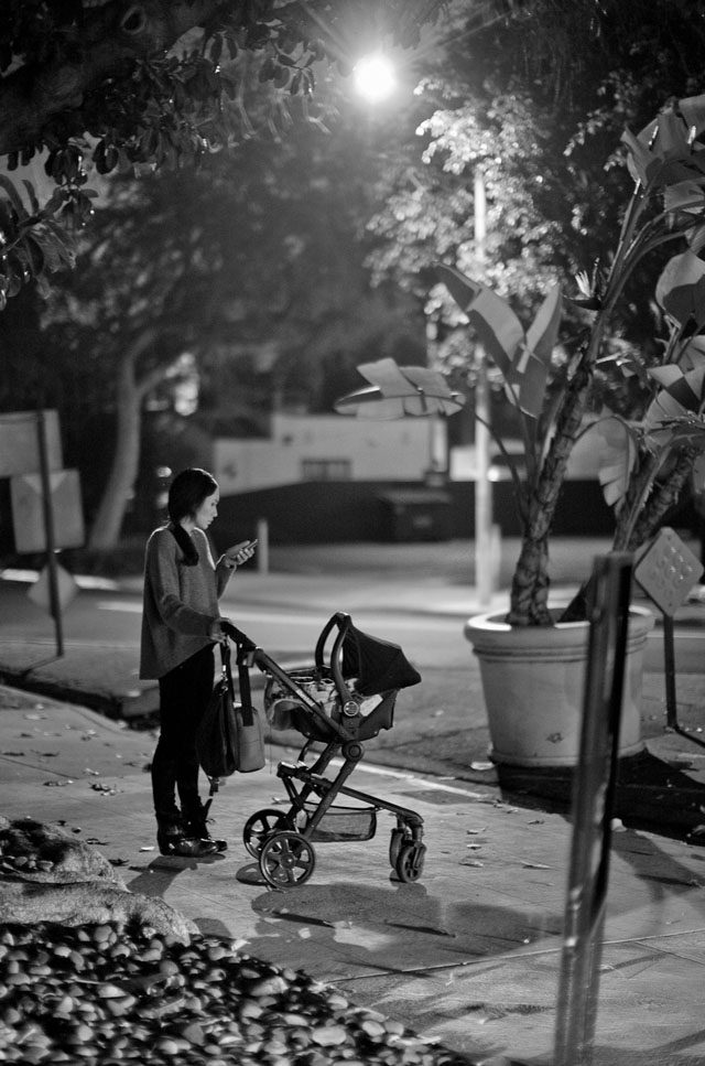 A mother walking her baby late night in Los Angeles. Leica M240 with Leica 50mm Summicron-M f/2.0 II. © Thorsten Obergaard. 