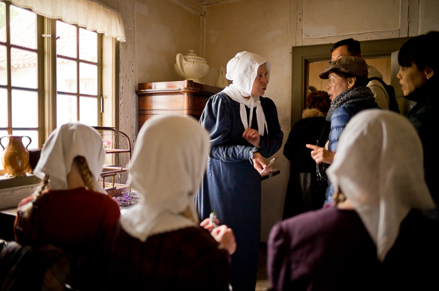 Tourists from Taipei, Taiwan visits The Old Town in Aarhus, Denmark where actors are in character as original 1984 citizens of the city. Leica M 240 with Leica 28mm Summilux-M ASPH f/1.4. © 2015 Thorsten Overgaard. Lightroom 2010 Process, colors with Sekonic C-700 Color Meter (5691 Kelvin).