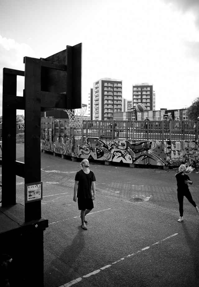 A couple playing volleyball in the Danish summer evening. Leica M 240 with Leica 28mm Summilux-M ASPH f/1.4at f/1.4. © 2015 Thorsten Overgaard.