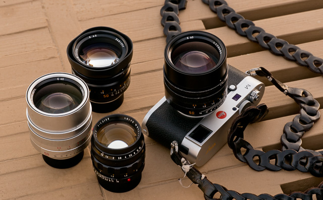 The Noctilux family (from bottom and clockwise): The very first 1966-model, the Leica Noctilux-M f/1.2 ASPH (model 11820, 1966-1975), the current 2008-model in silver, 50mm Noctilux-M ASPH f/0.95 FLE (FLoating Element, model 11667), the 50mm Noctilux-M f/1.0 with built-in hood (model 11822), and on the Leica M240 camera, the current 50mm Noctilux-M ASPH f/0.95 in black (model 11602). Not shown in the picture is the previous models of the 50mm Noctilux f/1.0 (three versions of the model 11821 from 1976-1993 with bayonet or clip-on lens shades; all of which has the same optical design as the one with the built-in plastic hood, but filter sizes from 58mm to 60mm). © 2016-2018 Thorsten von Overgaard. 
