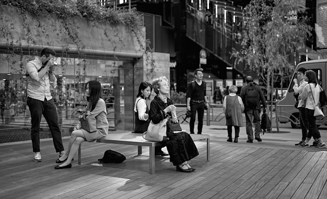 Gregory Robinson at the Sony crossing in Ginza where ther is an underground design shop and espressobar, with a park on street level. The space is supposed to be a new large Sony building, and while waiting approval, it has become a cozy area to hang out. Leica M10-P with Leica 50mm APO-Summicron-M f/2.0. © Thorsten Overgaard. 