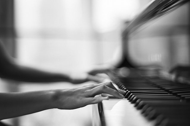 Ms. Yuan playing the piano in Kuala Lumpur. Leica M10-P with 7artisans 50mm f/1.1. © Thorsten Overgaard.   