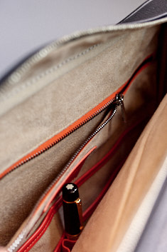 One zipped large compartment for cables, card reader, memory stick, WhiBal cards and all the loose parts you don't want to have floating around somewhere else.