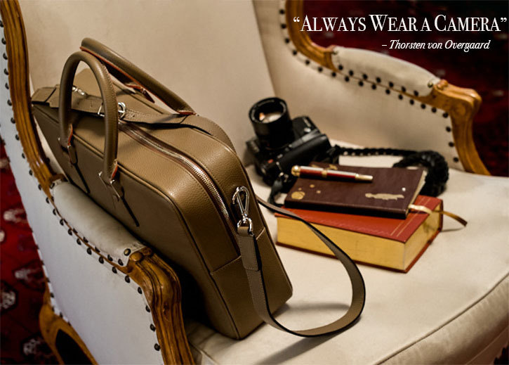 A travel bag, for cameras.The 'Tokyo' model is light brown 'Taupe' soft calfskin. 
