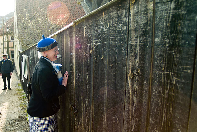 Queen Margrethe found a crack in the fence and wants to see what's in there. Leica R9 with Leica 35-70mm Vario-Elmarit-R ASPH f/2.8. © Thorsten von Overgaard.
