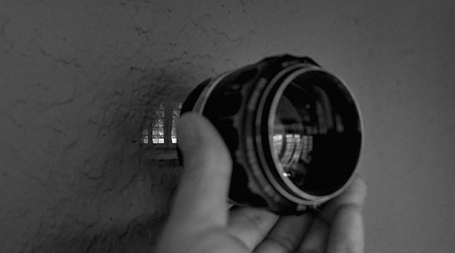 The image of my french doors in my house projected onto the wall via the 58mm Minolta f/1.2 lens. © Thorsten Overgaard.