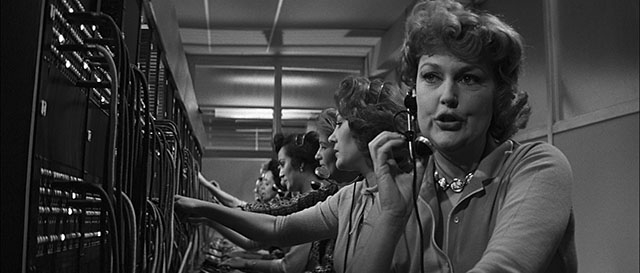 Great composition, and notice that the faces are exposed so the skin looks right. The Apartment (1960, directed by Billy Wilder, cinematography by Joseph LaShelle).