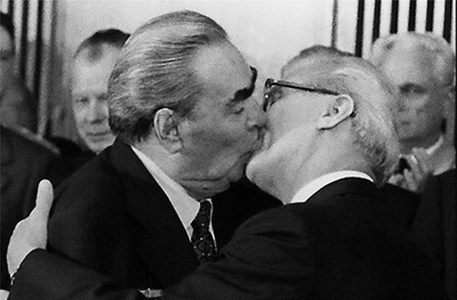 German Leica photographer Barbara Klemm (born 1939) photographed "The Brother's Kiss" in 1979, Soviet general secretary Leonid Brezhnev kissing East German leader Erich Honecker. Famlusly reproduced as a mural on the Berlin Wall. 