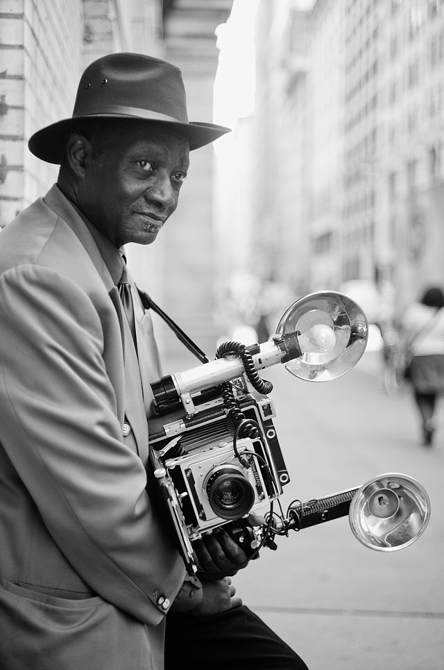 Around the corner I met the 72 year old photographer Louis Mendes. Since the 1970s he has been photographing people in public places with his 1959 Graflex Speed Graphic. Photo: Thorsten Overgaard, Leica M9 with Leica 50mm Summicron-M f/2.0 II.