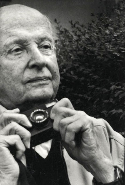 Henri Cartier-Bresson with his Leica Minilux