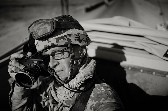War photographer Jan Grarup in Afghanistan 2013 with his Leica. 