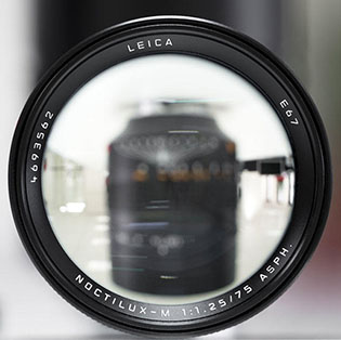 Lens engravings  Almost all Leica lenses have the vital information engraved on the front:  Brand name, focal length, aperture and name of the lens. Usually also the filter size (E67 = 67mm).