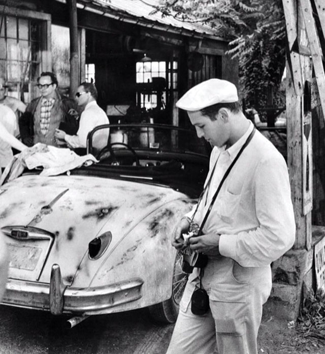 Paul Newman with his Leica (director Sidney Lumet and actor Marlon Brandoin the background). 