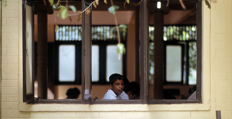 A student at the Buddhist Sunday School in Kandy, Sri Lanka. Leica SL mot with Leica 80mm Summilux-R f/1.4 © Thorsten Overgaard.