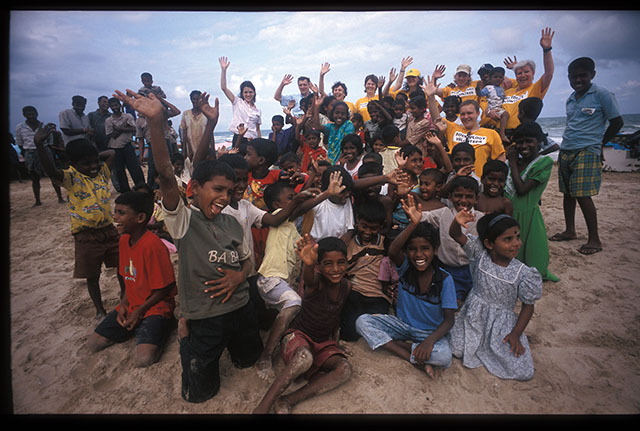 The children in Trinomalee in Sri Lanka where the families lived in temporarily tents and cottages after the tsunami that hit on December 26, 2004. Many of the kids were afraid of the ocean now, and the Scientology Volunteers helped the kids get in contact with the ocean gradually through plays and games. Leica M4 with Leica 21mm Super-Angular f/3.4. © Thorsten Overgaard. 