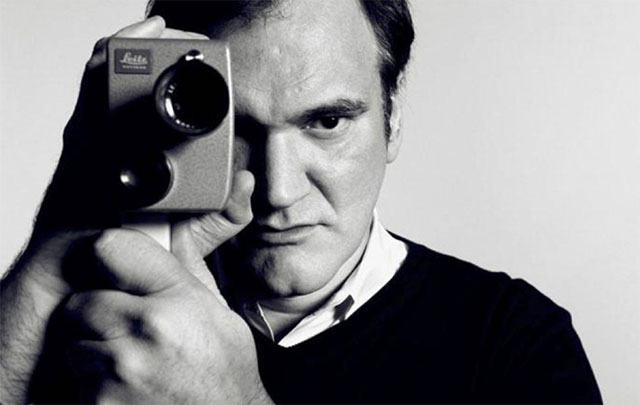 Quentin Tarantino with his Leitz Leicina S8 camera. Yes, Leiac used to make film camerasfor a short while. today they make Leitz Cine lenses. 
