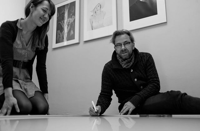 Lisa Kutzelnig of Leica Galerie Salzburg and Thorsten Overgaard signing the large images that has been sold at the evening of the vernissage. Only one large image is left, "The Couple" of two people having dinner at Paris Bar in Berlin (the woman holding a knife against her husband). The rest of the 68 images on the exhibition are almost all still available signed and in limited numbered editions in size 50 x 70 cm. For a list of images and prices, contact Karin Kaufmann at e-mail salzburg@leica-galerie.at